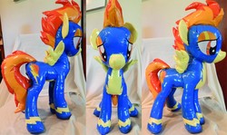 Size: 1280x761 | Tagged: safe, artist:plushypuppy, spitfire, inflatable pony, pegasus, pony, g4, clothes, female, inflatable, inflatable pegasus, irl, mare, photo, plushie, shiny, solo, spread wings, standing, uniform, wings, wonderbolts uniform