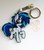 Size: 896x1024 | Tagged: safe, artist:king-franchesco, dj pon-3, vinyl scratch, pony, unicorn, g4, cutie mark, female, hooves, horn, irl, keychain, mare, photo, raised hoof, solo, sunglasses