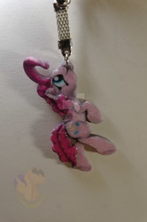 Size: 1024x1539 | Tagged: safe, artist:king-franchesco, pinkie pie, earth pony, pony, g4, cutie mark, female, hooves, irl, keychain, mare, mouth hold, photo, solo