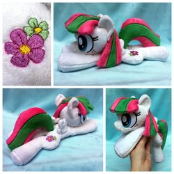 Size: 1600x1600 | Tagged: safe, artist:equinepalette, blossomforth, pegasus, pony, g4, beanie (plushie), female, hand, irl, mare, photo, plushie, prone, solo, spread wings, wings
