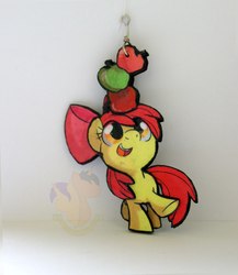 Size: 888x1024 | Tagged: safe, artist:king-franchesco, apple bloom, earth pony, pony, g4, apple, female, filly, foal, food, hooves, irl, keychain, open mouth, photo, solo, teeth