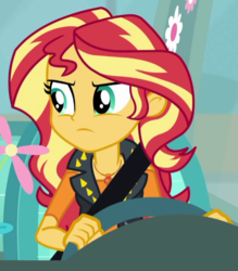 Size: 507x578 | Tagged: safe, screencap, sunset shimmer, driving miss shimmer, driving miss shimmer: fluttershy, equestria girls, g4, my little pony equestria girls: better together, cropped, female, fluttershy's car, geode of empathy, magical geodes, seatbelt, solo, steering wheel