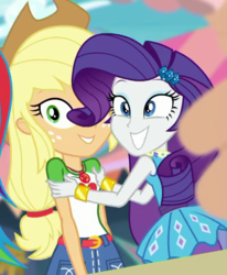 Size: 527x641 | Tagged: safe, screencap, applejack, rarity, equestria girls, equestria girls specials, g4, my little pony equestria girls: better together, my little pony equestria girls: rollercoaster of friendship, cropped, female, geode of shielding, geode of super strength, magical geodes, rarity peplum dress, shipping fuel, smiling