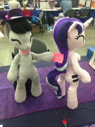 Size: 768x1024 | Tagged: safe, artist:onevioletrose, octavia melody, starlight glimmer, earth pony, pony, unicorn, bronycon, bronycon 2018, g4, anthro plushie, bipedal, cute, equal cutie mark, eyes closed, free hugs, glimmerbetes, hat, irl, note, photo, plushie, smiling, standing, tavibetes