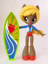 Size: 846x1128 | Tagged: safe, artist:whatthehell!?, applejack, equestria girls, g4, clothes, dark skin, doll, equestria girls minis, irl, photo, ponied up, recolor, sandals, solo, surfboard, swimsuit, toy