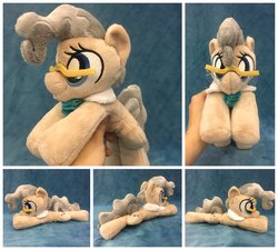Size: 1600x1440 | Tagged: safe, artist:equinepalette, mayor mare, earth pony, pony, g4, beanie (plushie), female, glasses, hand, irl, mare, photo, plushie, prone, solo