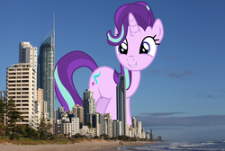 Size: 5572x3744 | Tagged: safe, artist:auskeldeo, artist:paganmuffin, starlight glimmer, pony, unicorn, g4, absurd resolution, australia, brisbane, female, giant pony, giant starlight glimmer, giantess, gold coast, highrise ponies, irl, macro, mare, photo, ponies in real life, smiling, solo