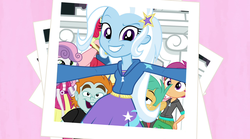 Size: 1280x714 | Tagged: safe, screencap, apple bloom, big macintosh, scootaloo, snails, snips, sweetie belle, trixie, equestria girls, g4, my little pony equestria girls: rainbow rocks, barrette, cutie mark crusaders, inconvenient trixie, photobomb, photobombing trixie, picture, wondercolt statue