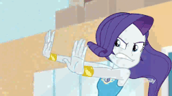 Size: 762x428 | Tagged: safe, screencap, rarity, vignette valencia, equestria girls, equestria girls series, g4, rollercoaster of friendship, animated, attack, clothes, female, gem, geode of shielding, jacket, park, phone, shield