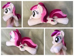 Size: 1024x768 | Tagged: safe, artist:equinepalette, roseluck, earth pony, pony, g4, beanie (plushie), female, hand, irl, mare, photo, plushie, prone, solo