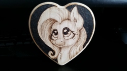 Size: 5312x2988 | Tagged: safe, artist:horseez, fluttershy, pegasus, pony, g4, bust, chest fluff, female, heart, mare, portrait, pyrography, smiling, solo, traditional art