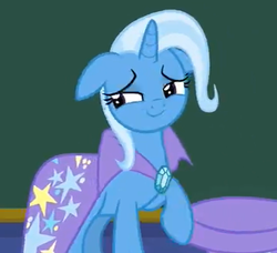 Size: 516x470 | Tagged: safe, screencap, trixie, pony, unicorn, a matter of principals, g4, cape, chalkboard, clothes, cute, diatrixes, female, floppy ears, hat, mare, raised hoof, smiling, solo, trixie's cape, trixie's hat