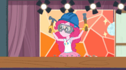 Size: 538x302 | Tagged: safe, screencap, pinkie pie, constructive criticism, constructive criticism: pinkie pie, equestria girls, g4, my little pony equestria girls: better together, my little pony equestria girls: choose your own ending, animated, building, female, goggles, hammer, hard hat, lights, nails, pinkie being pinkie, song of my people