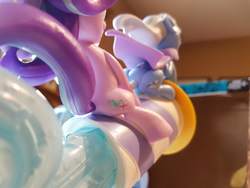 Size: 4032x3024 | Tagged: safe, starlight glimmer, trixie, pony, unicorn, g4, official, butt, cutie mark, duo, fan series, figurine, guardians of harmony, irl, merchandise, photo, plot, rocket, toy, trixie's rocket
