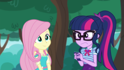 Size: 1280x720 | Tagged: safe, screencap, fluttershy, sci-twi, twilight sparkle, equestria girls, equestria girls series, g4, text support, female, geode of fauna, geode of telekinesis, glasses, ponytail, text support: fluttershy