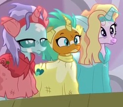 Size: 404x353 | Tagged: safe, screencap, ocellus, silverstream, smolder, changedling, changeling, dragon, hippogriff, g4, horse play, clothes, clothing damage, costume, cropped, dragoness, fake ears, fake horn, female, ocellus is not amused, prosthetic butt, trio, varying degrees of want, wig