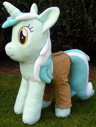 Size: 1056x1394 | Tagged: safe, artist:hoppip, lyra heartstrings, pony, unicorn, g4, clothes, female, infamous, irl, lyra plushie, mare, outdoors, pants, photo, plothole plush lyra, plushie, side view, smiling, solo, standing, tail, tail hole