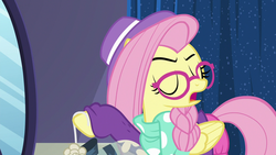 Size: 1280x720 | Tagged: safe, screencap, fluttershy, pegasus, pony, fake it 'til you make it, alternate hairstyle, eyes closed, female, glasses, hipstershy, mare, open mouth, solo