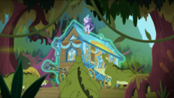 Size: 1570x885 | Tagged: safe, screencap, starlight glimmer, crocodile, pony, unicorn, g4, road to friendship, eyes closed, female, gritted teeth, hoo'far's wagon, magic, mangrove tree, mare, solo, swamp, telekinesis, tree, wagon