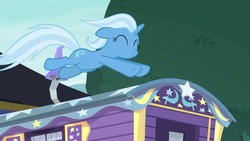 Size: 1280x720 | Tagged: safe, screencap, trixie, pony, unicorn, g4, road to friendship, eyes closed, female, floppy ears, leaping, mare, smiling, solo, trixie's wagon, wagon