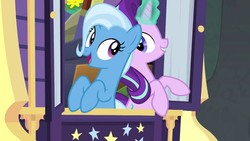 Size: 1280x720 | Tagged: safe, screencap, starlight glimmer, trixie, pony, unicorn, g4, road to friendship, duo, duo female, female, glowing horn, horn, magic, magic aura, mare, open mouth, smiling, trixie's wagon