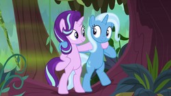 Size: 1280x720 | Tagged: safe, screencap, starlight glimmer, trixie, pony, unicorn, g4, road to friendship, belly, bipedal, cute, diatrixes, duo, duo female, female, glimmerbetes, hooves on hips, mare, shipping fuel, smiling, tree