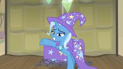 Size: 1255x706 | Tagged: safe, screencap, trixie, pony, unicorn, g4, road to friendship, cape, chest, clothes, female, grin, hat, mare, raised hoof, smiling, solo, stage, trixie's cape, trixie's hat