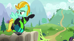 Size: 1280x720 | Tagged: safe, screencap, lightning dust, pegasus, pony, g4, the washouts (episode), clothes, female, flying, goggles, helmet, hill, mare, path, pointing, solo, uniform, washouts uniform