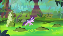 Size: 1280x720 | Tagged: safe, screencap, starlight glimmer, crocodile, pony, unicorn, g4, my little pony: friendship is magic, road to friendship, animal, female, jumping, mangrove tree, mare, solo, swamp, tree, water