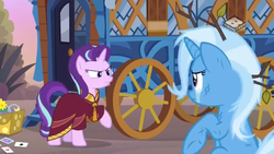 Size: 1280x720 | Tagged: safe, screencap, starlight glimmer, trixie, pony, unicorn, g4, road to friendship, clothes, crying, duo, duo female, female, hoo'far's wagon, mare, messy mane, robe, teary eyes, tree branch, wagon