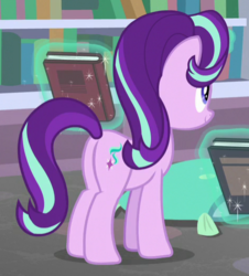 Size: 473x523 | Tagged: safe, screencap, starlight glimmer, pony, unicorn, g4, the end in friend, book, butt, cropped, female, glowing horn, horn, magic, mare, plot, smiling, solo, telekinesis