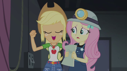 Size: 1280x720 | Tagged: safe, screencap, applejack, fluttershy, equestria girls, g4, my little pony equestria girls: better together, opening night, female, fist, geode of super strength, script