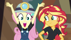 Size: 1280x720 | Tagged: safe, screencap, fluttershy, sunset shimmer, equestria girls, equestria girls series, g4, opening night, arms in the air, female, headlamp, helmet, miner, mining helmet, opening night: sunset shimmer