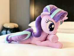 Size: 1024x768 | Tagged: safe, artist:nekokevin, starlight glimmer, pony, unicorn, series:nekokevin's glimmy, g4, bed, crossed hooves, cute, female, glimmerbetes, irl, lying down, mare, photo, plushie, prone, smiling, solo, underhoof
