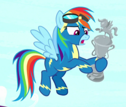 Size: 476x404 | Tagged: safe, screencap, rainbow dash, pegasus, pony, g4, yakity-sax, clothes, cropped, female, goggles, mare, open mouth, solo, spread wings, trophy, uniform, wings, wonderbolts uniform