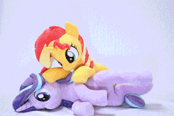 Size: 400x267 | Tagged: safe, artist:nekokevin, starlight glimmer, sunset shimmer, pony, unicorn, series:nekokevin's glimmy, g4, animated, cpr, female, gif, irl, mare, nekokevin is trying to murder us, photo, plushie, smiling, stop motion, underhoof