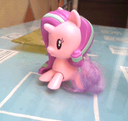 Size: 300x282 | Tagged: safe, starlight glimmer, pony, unicorn, g4, animated, cute, cutie mark crew, female, gif, glim glam, glimmerbetes, irl, it's coming right at us, majestic as fuck, mare, mcdonald's, mcdonald's happy meal toys, photo, slow motion, toy