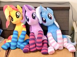 Size: 1024x768 | Tagged: safe, artist:nekokevin, starlight glimmer, sunset shimmer, trixie, pony, unicorn, series:nekokevin's glimmy, g4, clothes, counterparts, cute, female, irl, looking at you, magical trio, mare, photo, plushie, sitting, socks, striped socks, trio, twilight's counterparts