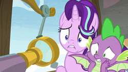 Size: 1280x720 | Tagged: safe, screencap, spike, starlight glimmer, dragon, a matter of principals, g4, lip bite, telescope, winged spike, wings, worried