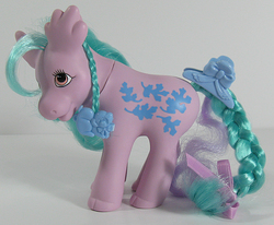 Size: 727x600 | Tagged: safe, oakly, moose, g1, bow, irl, photo, pony friends, tail bow, tail clip, toy