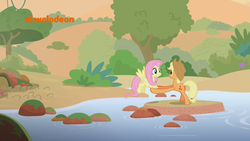 Size: 1920x1080 | Tagged: safe, screencap, applejack, fluttershy, earth pony, pegasus, pony, g4, sounds of silence, duo, female, helping, mare, nickelodeon, river, stream, stretching, water