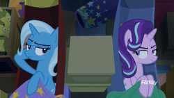 Size: 1920x1080 | Tagged: safe, screencap, starlight glimmer, trixie, pony, unicorn, g4, road to friendship, annoyed, blanket, cannon, crate, discovery family logo, duo, duo female, eye contact, female, hammock, looking at each other, mare, trixie's wagon