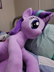 Size: 900x1200 | Tagged: safe, artist:nekokevin, starlight glimmer, pony, unicorn, series:nekokevin's glimmy, g4, bed, female, irl, lying down, mare, photo, pillow, plushie, smiling, solo