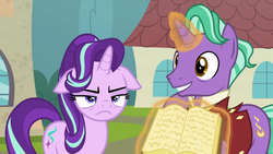 Size: 1366x768 | Tagged: safe, screencap, firelight, starlight glimmer, pony, unicorn, g4, the parent map, book, duo, father and daughter, female, floppy ears, magic, male, mare, sire's hollow, stallion, starlight glimmer is not amused, unamused