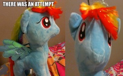 Size: 1116x695 | Tagged: safe, rainbow dash, pegasus, pony, g4, bed, blank flank, female, image macro, incorrect eye style, irl, looking at you, meme, messy mane, missing cutie mark, photo, plushie, solo, there was an attempt, tinsel, tinsel hair