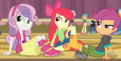 Size: 2462x1245 | Tagged: safe, screencap, apple bloom, photo finish, scootaloo, snails, snips, sweetie belle, equestria girls, g4, my little pony equestria girls: rainbow rocks, angry, apple bloom's bow, boots, bow, clothes, crossed legs, cutie mark crusaders, female, hair bow, jacket, looking at something, shirt, shoes, shorts, sitting, skirt, stage, trio, trio female