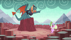 Size: 1024x579 | Tagged: safe, screencap, dragon lord torch, spike's fake mother, dragon, father knows beast, g4, dragon lands, dragoness, duo, female, male, pointing, solo
