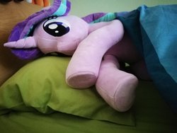 Size: 1200x900 | Tagged: safe, artist:nekokevin, starlight glimmer, pony, unicorn, series:nekokevin's glimmy, g4, bed, bedsheets, cute, female, glimmerbetes, irl, lying down, mare, photo, pillow, plushie, smiling, solo, underhoof