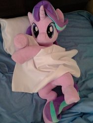 Size: 768x1024 | Tagged: safe, artist:nekokevin, starlight glimmer, pony, unicorn, series:nekokevin's glimmy, g4, bed, blanket, female, irl, looking at you, lying down, mare, photo, pillow, plushie, smiling, solo, underhoof