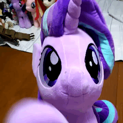 Size: 691x691 | Tagged: safe, artist:nekokevin, starlight glimmer, pony, unicorn, series:nekokevin's glimmy, g4, animated, cute, female, gif, glimmerbetes, irl, looking at you, mare, photo, plushie, smiling, solo, sweet dreams fuel, waving